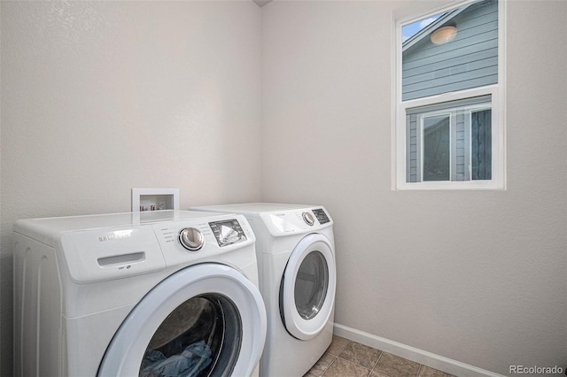 laundry area with washer and clothes dryer