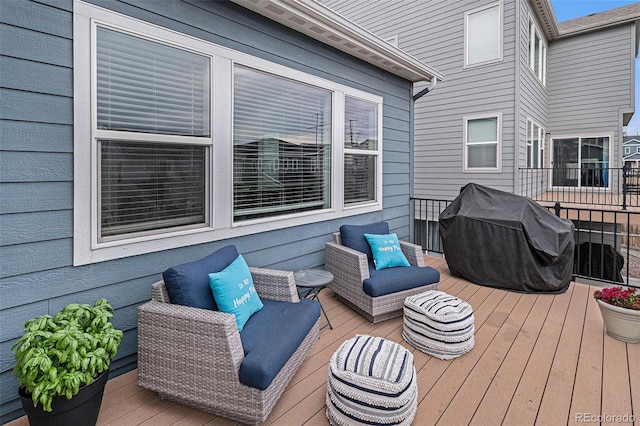 wooden deck with grilling area