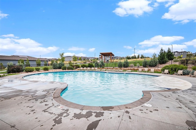 view of swimming pool featuring a patio