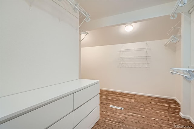 6487 W Weaver Ave, Littleton, CO 80123 - walk in closet featuring wood finished floors
