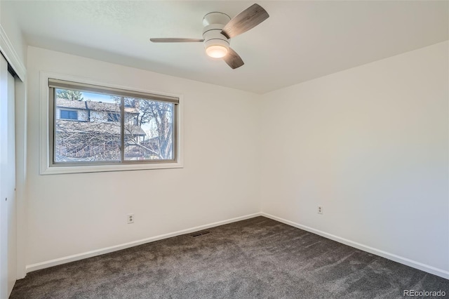 6487 W Weaver Ave, Littleton, CO 80123 - unfurnished bedroom featuring dark carpet, baseboards, a closet, and a ceiling fan