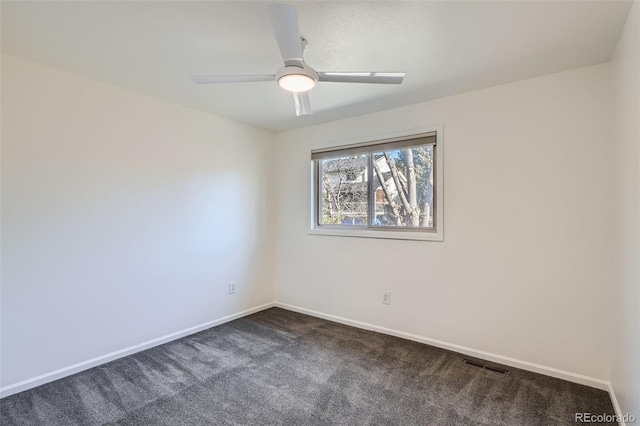 6487 W Weaver Ave, Littleton, CO 80123 - spare room featuring dark colored carpet, baseboards, and ceiling fan