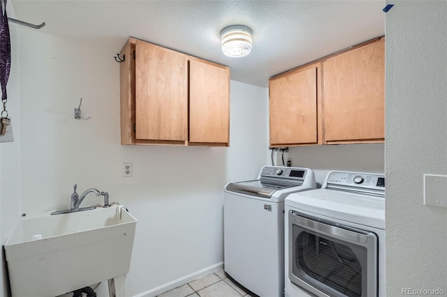 6487 W Weaver Ave, Littleton, CO 80123 - laundry area with cabinet space, separate washer and dryer, and light tile patterned flooring