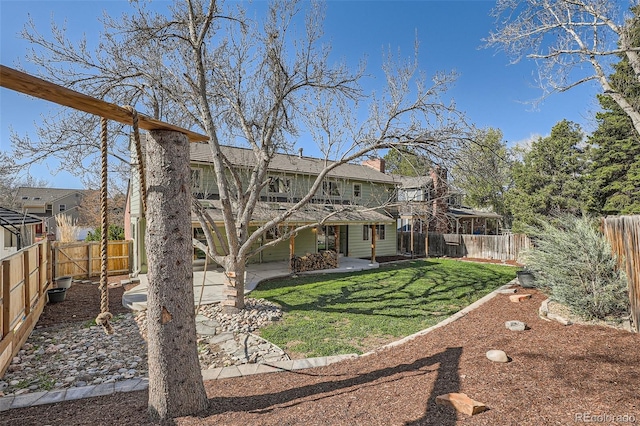 6487 W Weaver Ave, Littleton, CO 80123 - back of property with a patio