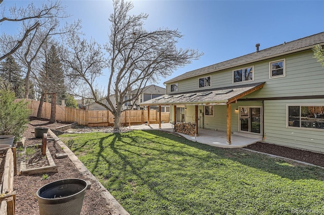 6487 W Weaver Ave, Littleton, CO 80123 - view of yard featuring a patio area and a vegetable garden
