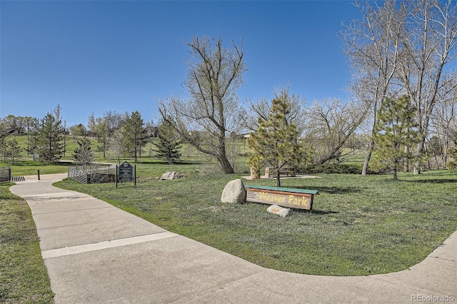 6487 W Weaver Ave, Littleton, CO 80123 - view of home's community with a lawn and driveway