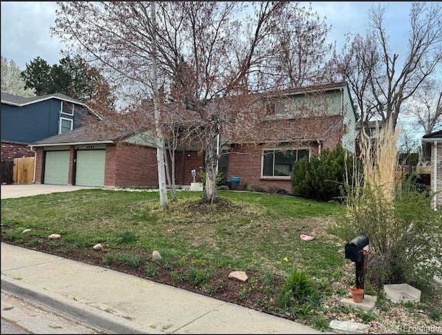 6487 W Weaver Ave, Littleton, CO 80123 - view of front of home with brick siding and driveway