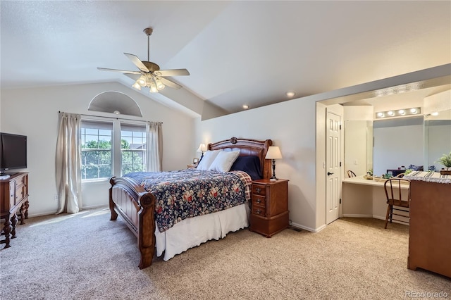 bedroom with light carpet, lofted ceiling, a ceiling fan, and baseboards