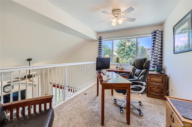 office with a ceiling fan and light carpet