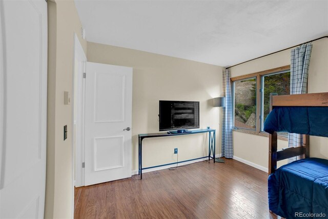 620 Macgregor Ave Unit 11, Estes Park, CO 80517 - bedroom featuring wood finished floors and baseboards