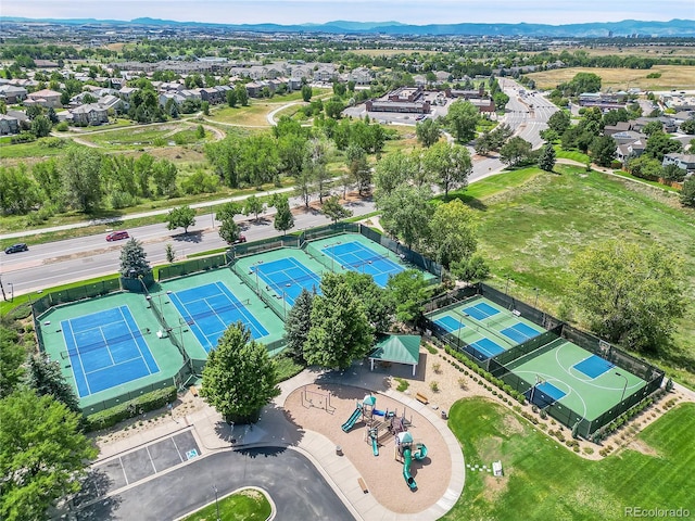 birds eye view of property featuring a mountain view