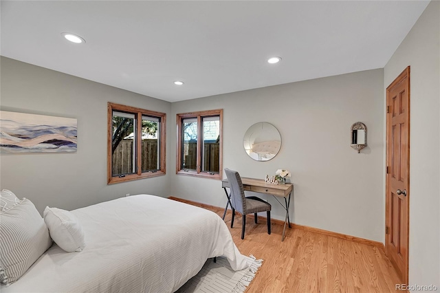 bedroom with light hardwood / wood-style flooring