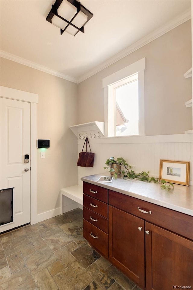 bathroom with crown molding