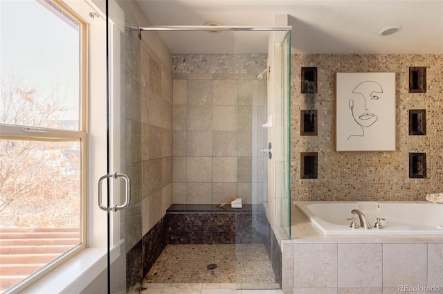 bathroom with independent shower and bath