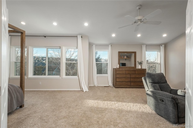 carpeted bedroom featuring baseboards, multiple windows, and recessed lighting