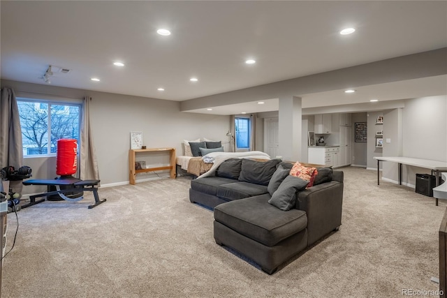 living room with baseboards, recessed lighting, and light colored carpet