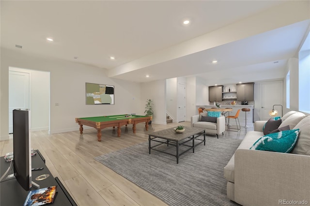 recreation room with light hardwood / wood-style flooring and billiards