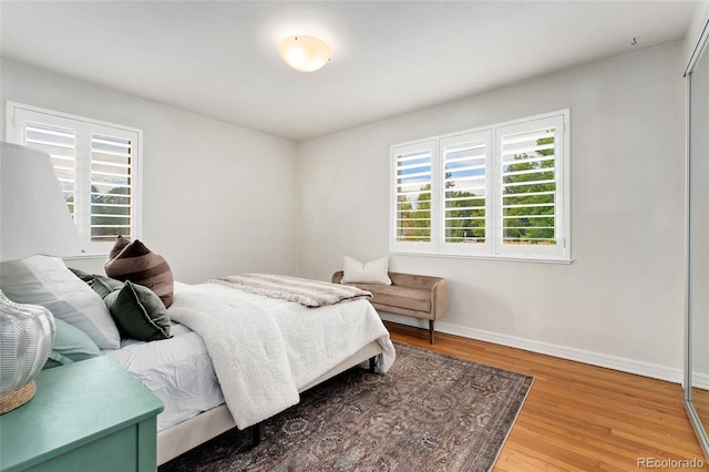 bedroom featuring hardwood / wood-style flooring