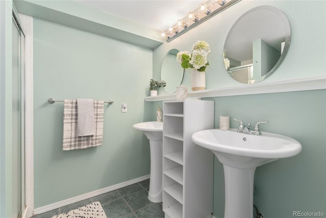 bathroom with sink and tile patterned floors