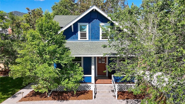 1519 16th St, Boulder, CO 80302 - view of front of house with covered porch and a shingled roof