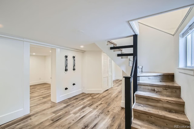 1519 16th St, Boulder, CO 80302 - staircase with wood finished floors and baseboards
