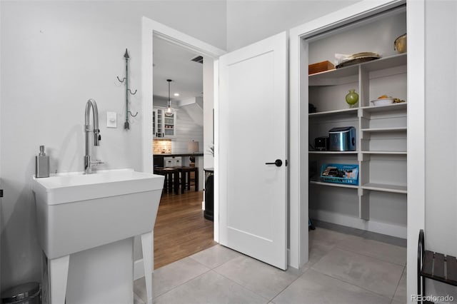 bathroom with tile patterned flooring