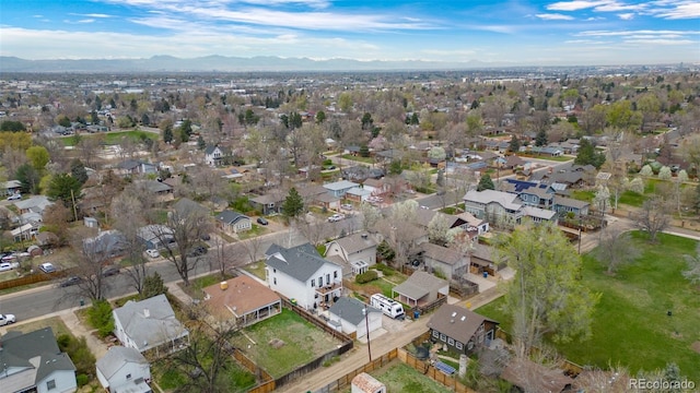 aerial view featuring a mountain view and a residential view
