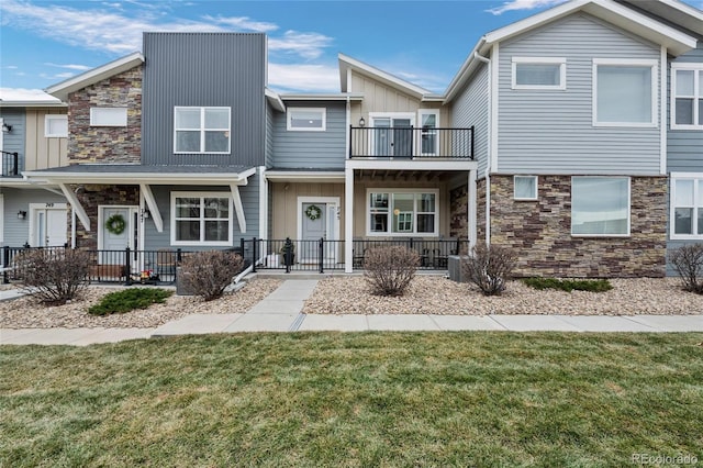 view of property with a front lawn