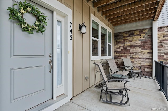 entrance to property with a porch