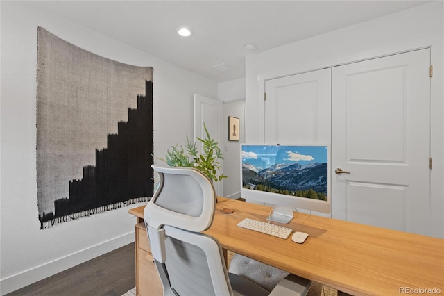 office space with dark hardwood / wood-style flooring