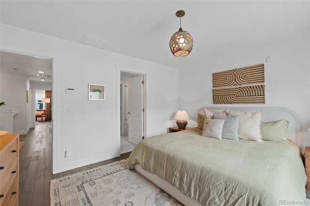 bedroom featuring wood-type flooring