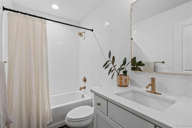 full bathroom featuring vanity, decorative backsplash, toilet, tile walls, and shower / tub combo with curtain