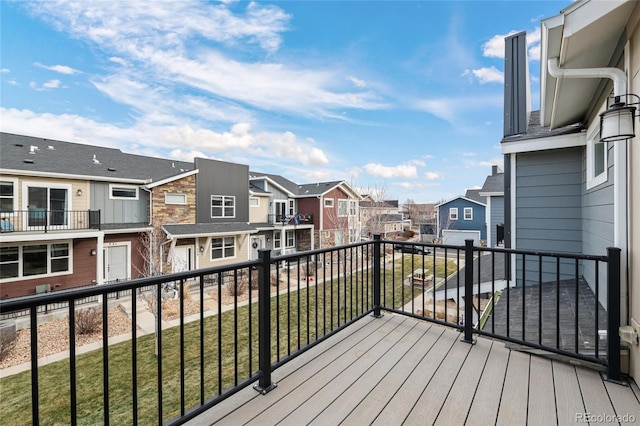 wooden deck with a yard