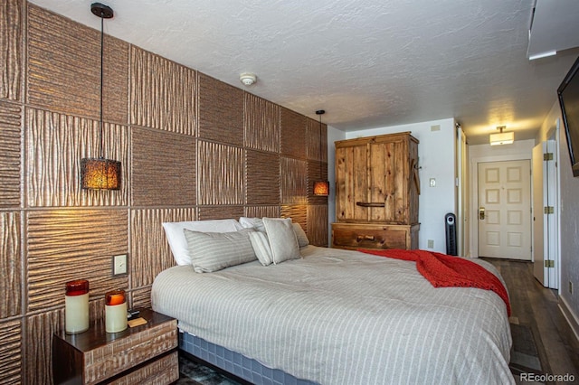 bedroom featuring a textured ceiling