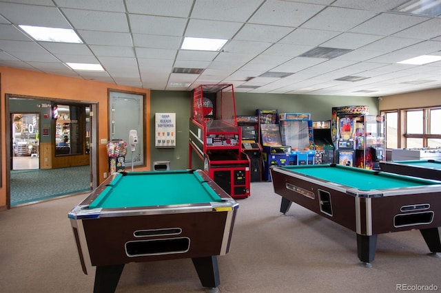 rec room with pool table, a paneled ceiling, and light colored carpet