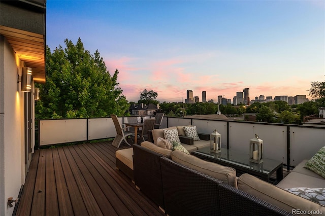 2523 N Humboldt St, Denver, CO 80205 - wooden deck featuring outdoor lounge area and a view of skyline