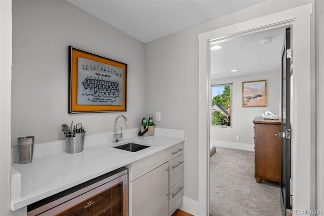 2523 N Humboldt St, Denver, CO 80205 - indoor wet bar featuring beverage cooler, light colored carpet, and recessed lighting
