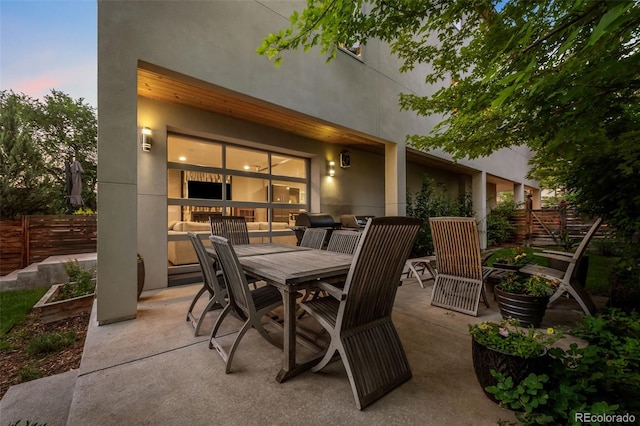 2523 N Humboldt St, Denver, CO 80205 - patio terrace at dusk with a patio area and outdoor dining area