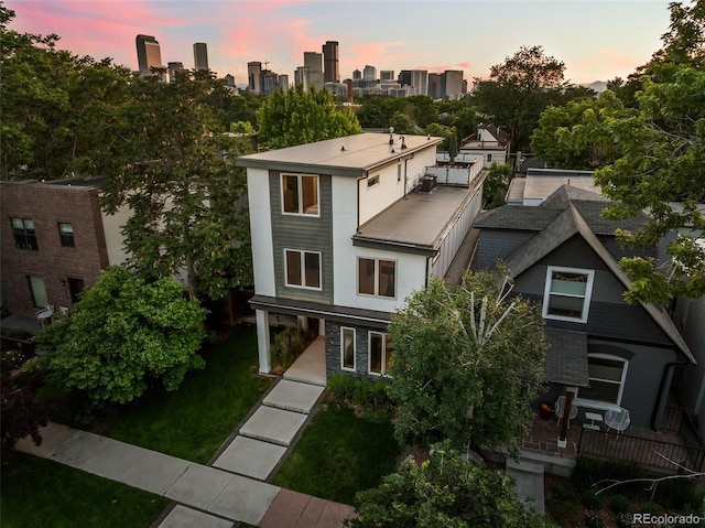 2523 N Humboldt St, Denver, CO 80205 - view of front of house featuring a skyline view
