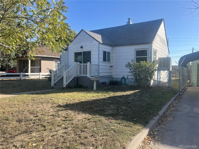 bungalow featuring a front yard