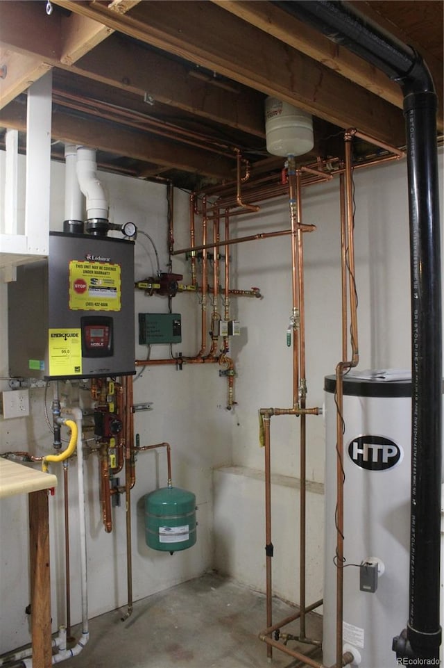 utility room featuring water heater and gas water heater