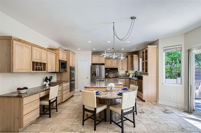 7482 Routt Ln, Arvada, CO 80005 - dining room featuring recessed lighting and baseboards