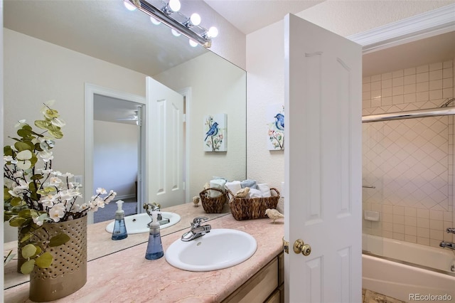 7482 Routt Ln, Arvada, CO 80005 - bathroom featuring vanity and shower / bath combination