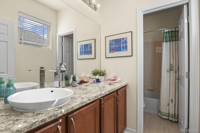 full bath featuring shower / bath combination with curtain and vanity