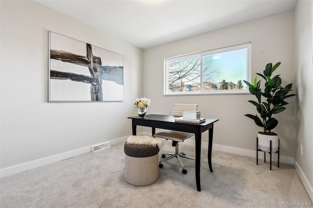 office area with light colored carpet