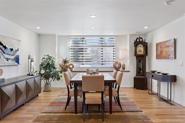 dining space featuring light hardwood / wood-style floors