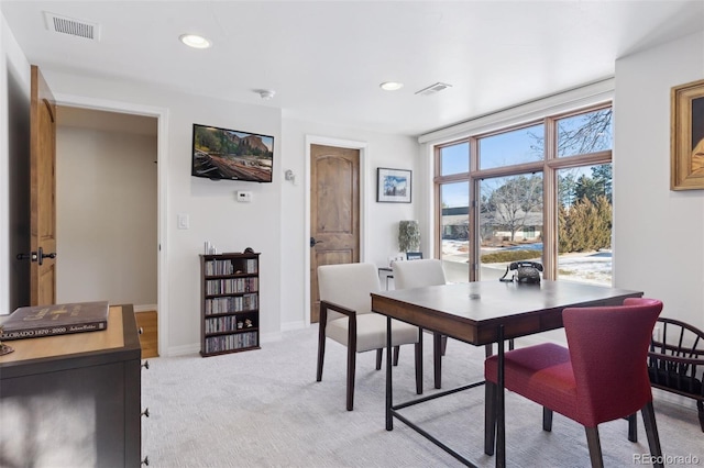 view of carpeted dining space