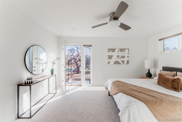 bedroom with access to exterior, carpet, and ceiling fan