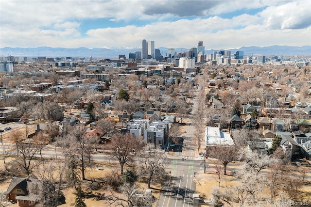 property's view of city featuring a mountain view