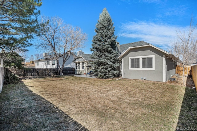 view of yard featuring a fenced backyard